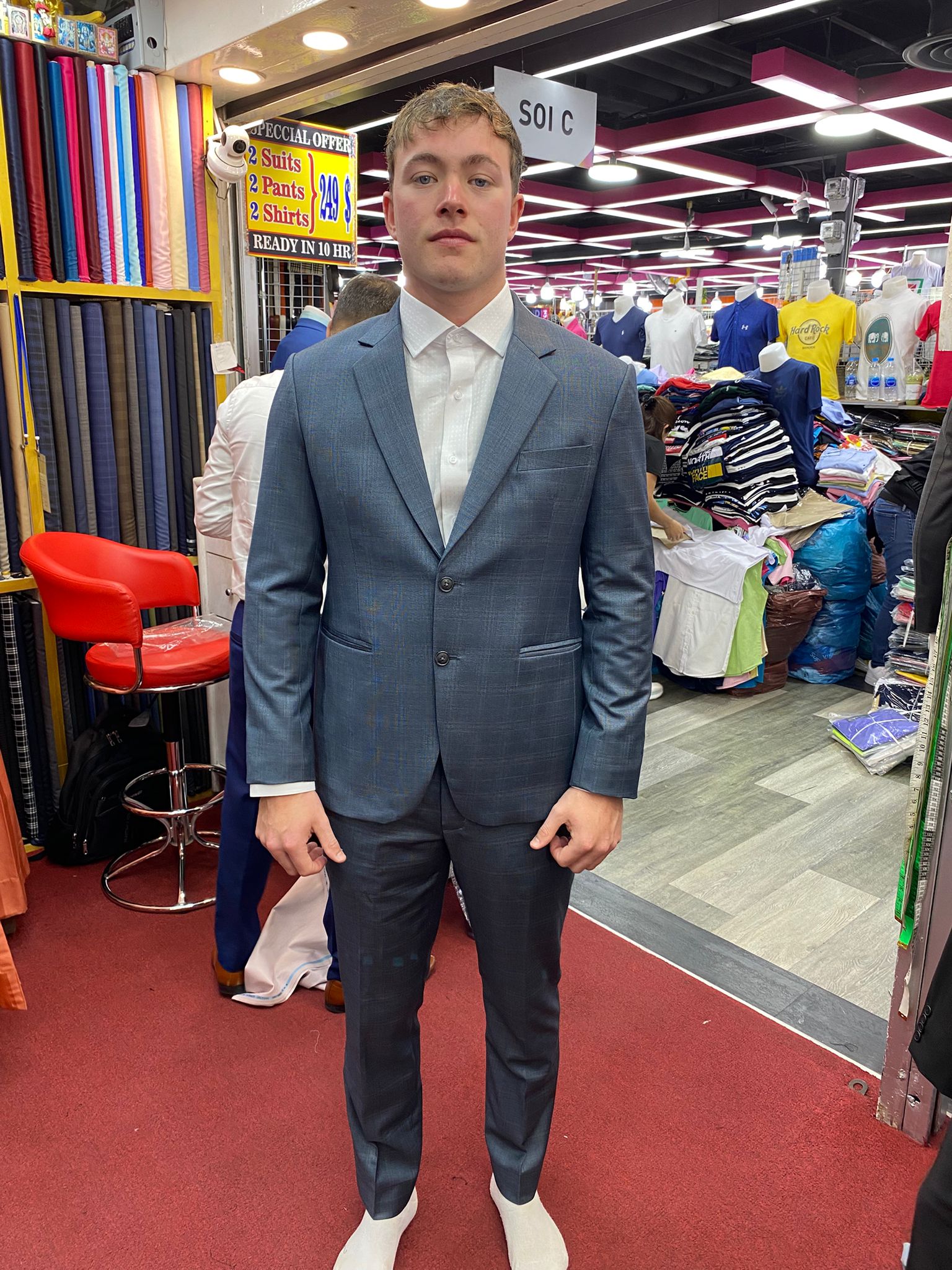 Happy client in custom tailored suit at King Fashion Uni Bangkok
